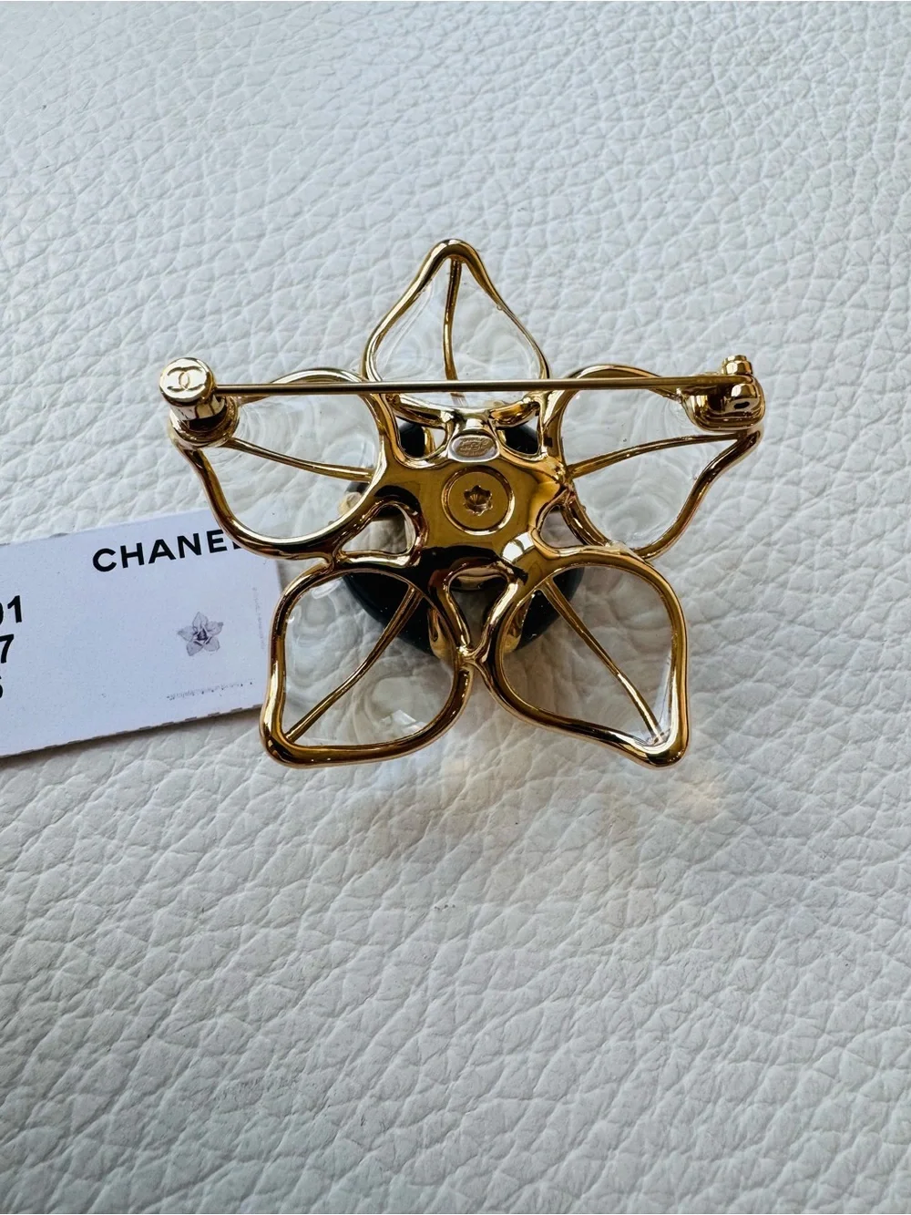 CHANEL New 2026 Black, Clear and Gold Camellia Brooch